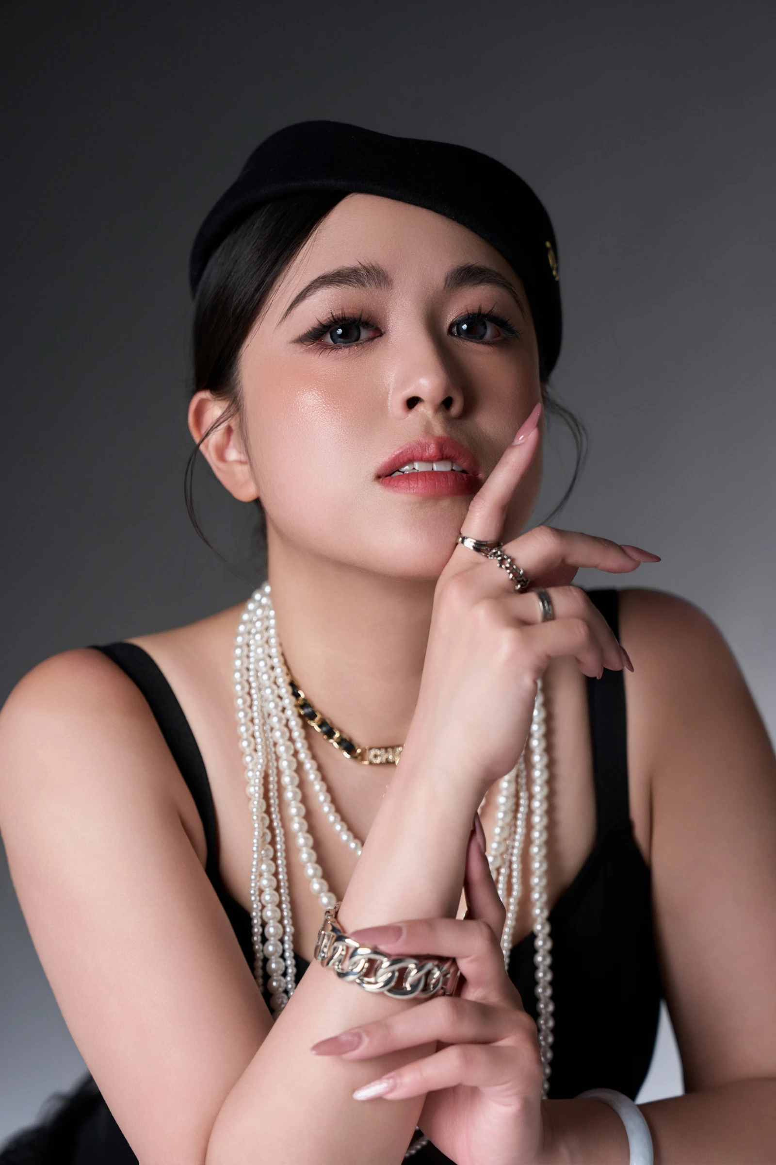 Tiffany Iris — Black beret and pearls beauty portrait